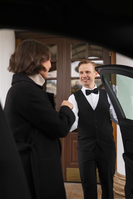 medium-shot-valet-doing-his-job (1) (2)